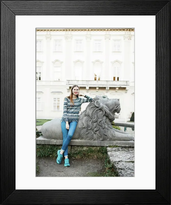 Framed Print : young female tourist walks the streets of Salzburg in Austria