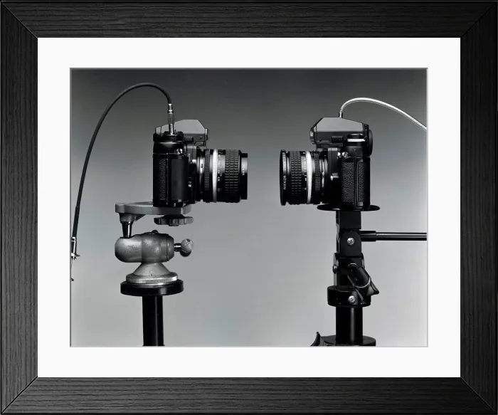 Framed Print : Close-up of two cameras Framed Print : Close-up of two cameras
