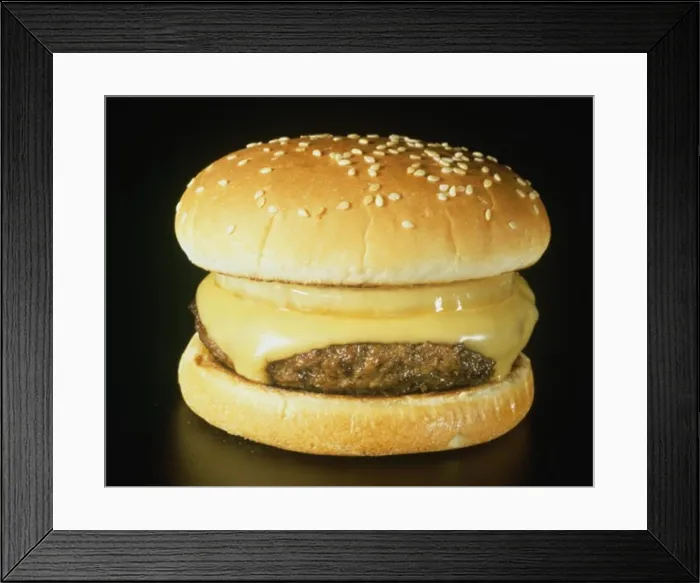 Framed Print : Close-up of a cheeseburger Framed Print : Close-up of a cheeseburger