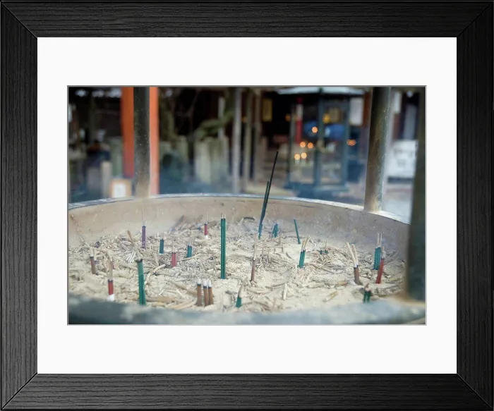 Framed Print : Close_up of a purification incense bowl at the entrance of a japanese temple, kyoto, japan