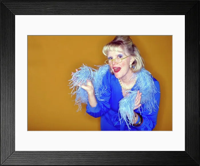 Framed Print : Portrait of a senior woman gesturing Framed Print : Portrait of a senior woman gesturing