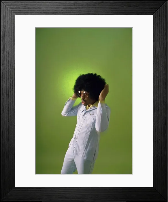 Framed Print : Young man with his hand in his hair Framed Print : Young man with his hand in his hair