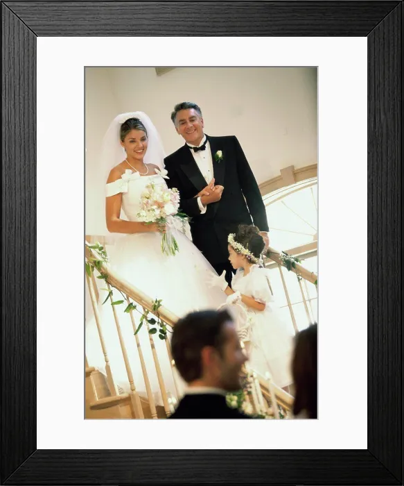 Framed Print : Bride walking down stairs with her father