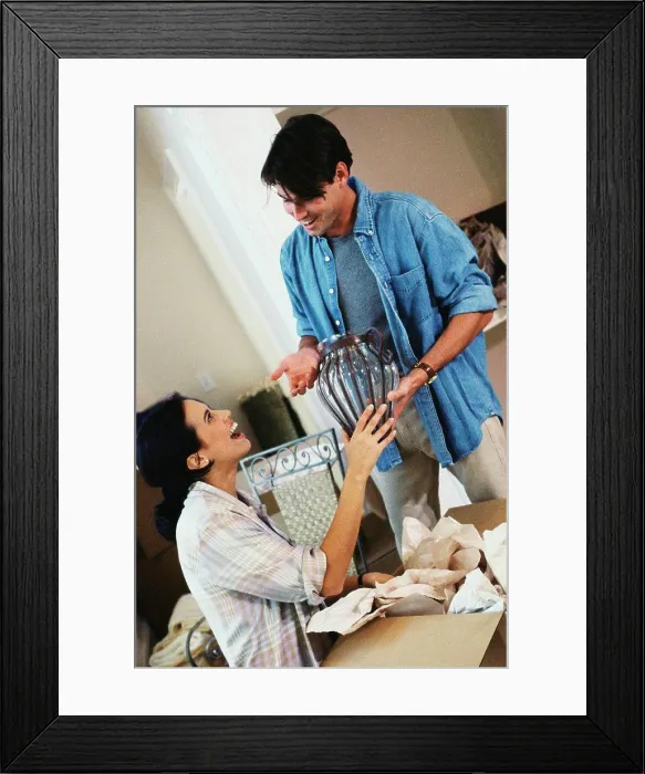 Framed Print : Young couple unpacking in their new house Framed Print : Young couple unpacking in their new house