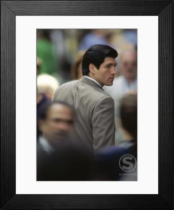 Framed Print : Rear view of a businessman looking away Framed Print : Rear view of a businessman looking away