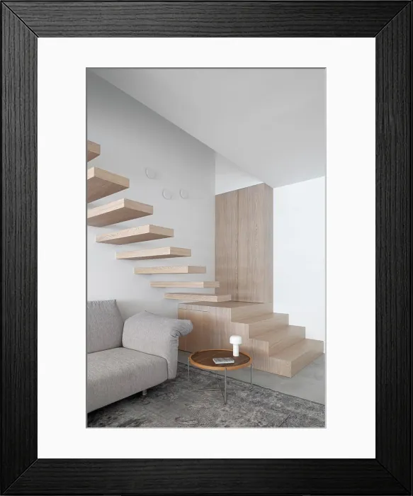 Framed Print : Living area with cantilevered stairs to the bedrooms