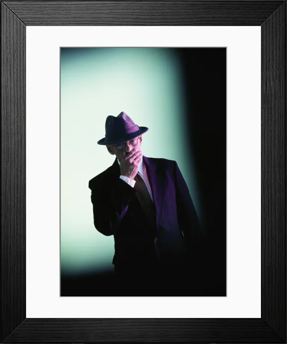 Framed Print : Businessman covering his mouth with his hand Framed Print : Businessman covering his mouth with his hand