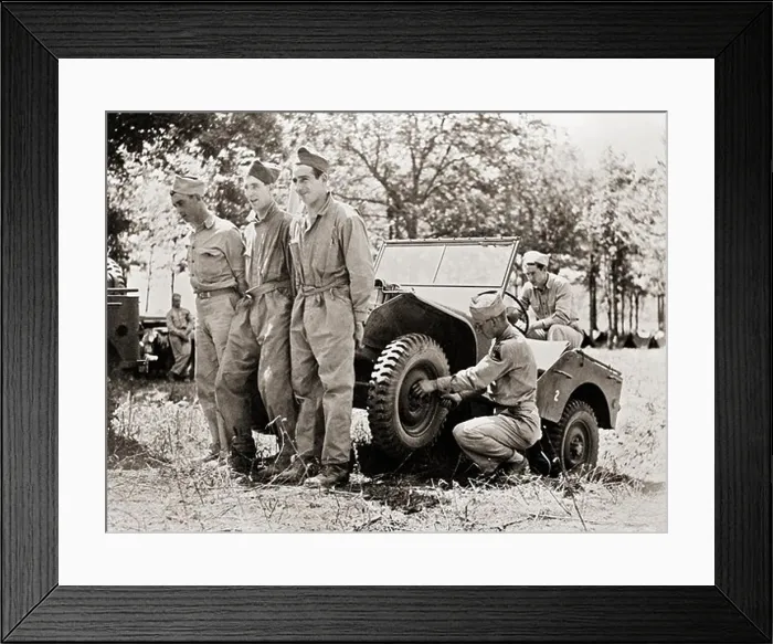 Framed Print : Lifting a Jeep Framed Print : Lifting a Jeep
