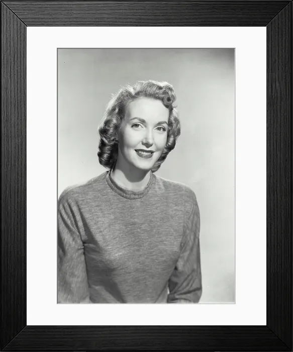 Framed Print : Portrait of a young woman smiling Framed Print : Portrait of a young woman smiling