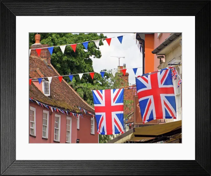 Framed Print : England, Essex, Saffron Walden. Union Jack flags and red white and blue bunting flying in Thaxted Framed Print : England, Essex, Saffron Walden. Union Jack flags and red white and blue bunting flying in Thaxted