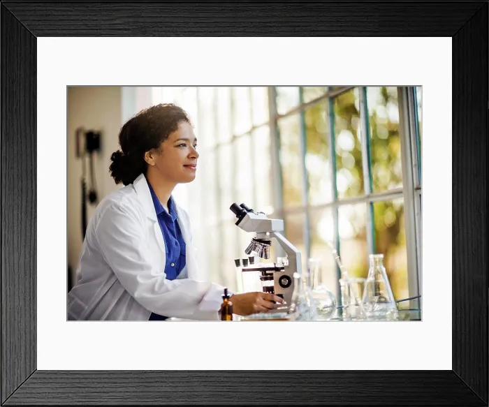 Framed Print : Kind young nurse giving her elderly patient a hug Framed Print : Kind young nurse giving her elderly patient a hug