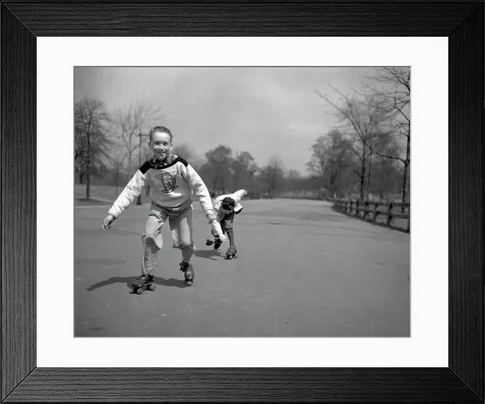 Framed Print : Children roller skating in park Framed Print : Children roller skating in park