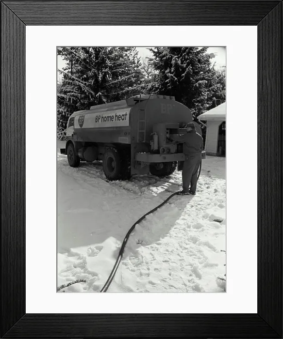 Framed Print : Man standing near a fuel tanker Framed Print : Man standing near a fuel tanker