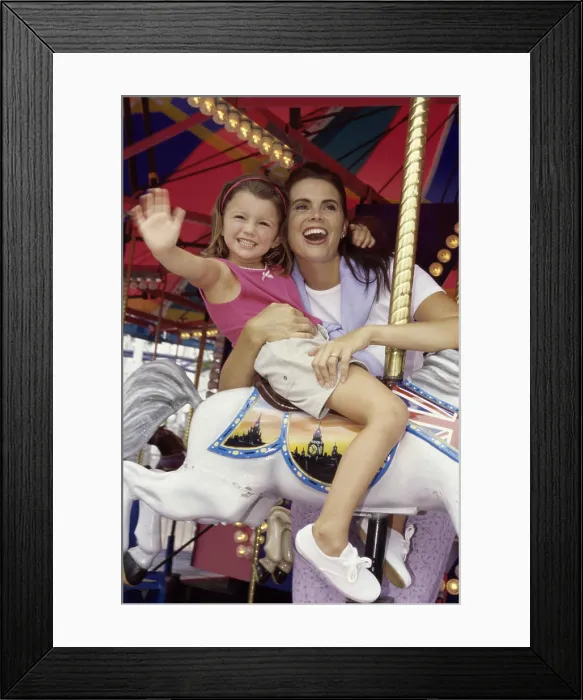 Framed Print : Mother and her daughter on a carousel Framed Print : Mother and her daughter on a carousel