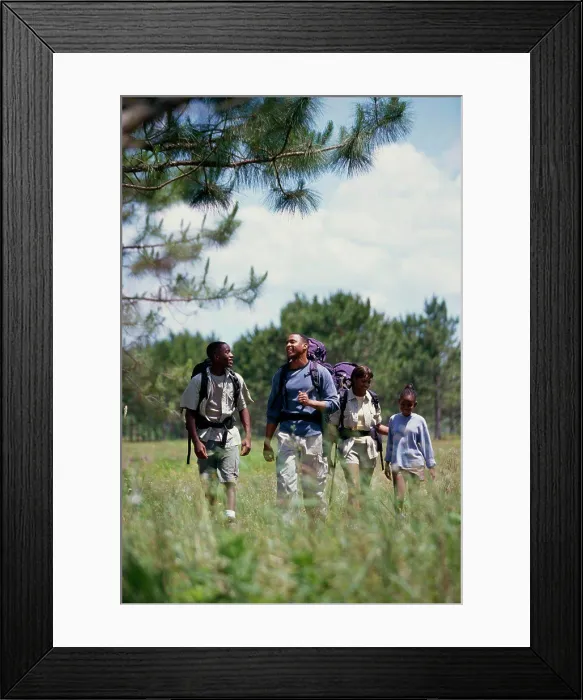 Framed Print : Parents hiking with their son and daughter