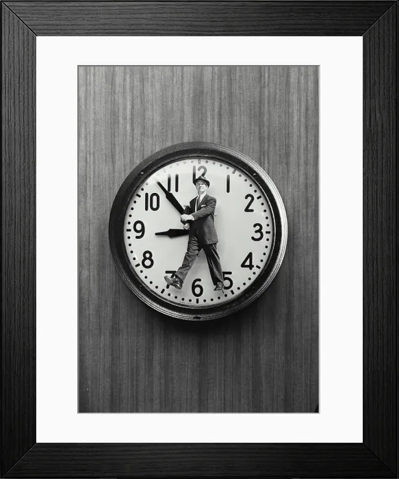 Framed Print : Vintage Photograph. Cutout of man wearing suit walking placed on clock face, Frame 1 Framed Print : Vintage Photograph. Cutout of man wearing suit walking placed on clock face, Frame 1