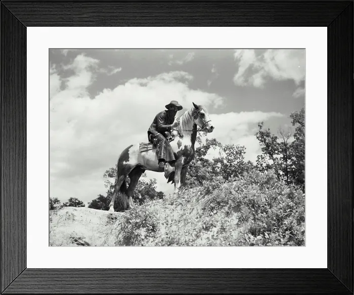 Framed Print : Vintage Photograph. Man in chaps and bandana riding on horses back. Frame 2 Framed Print : Vintage Photograph. Man in chaps and bandana riding on horses back. Frame 2
