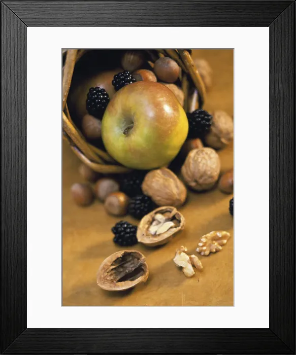 Framed Print : Close-up of fruits and nuts spilling from a basket Framed Print : Close-up of fruits and nuts spilling from a basket