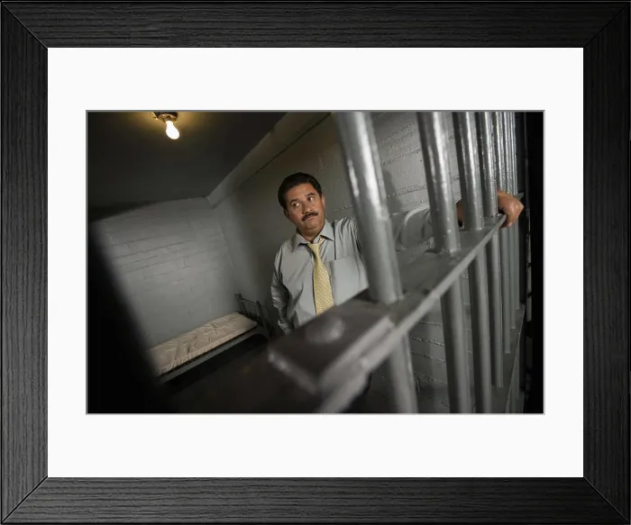 Framed Print : Criminal behind bars in jail Framed Print : Criminal behind bars in jail