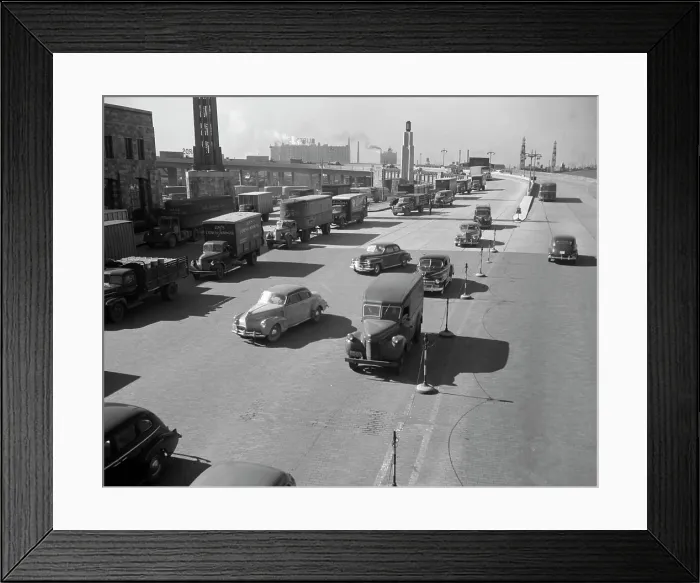 Framed Print : Lorries queuing near industrial building, high angle view