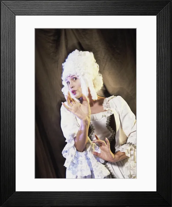 Framed Print : Low angle view of a female opera singer performing