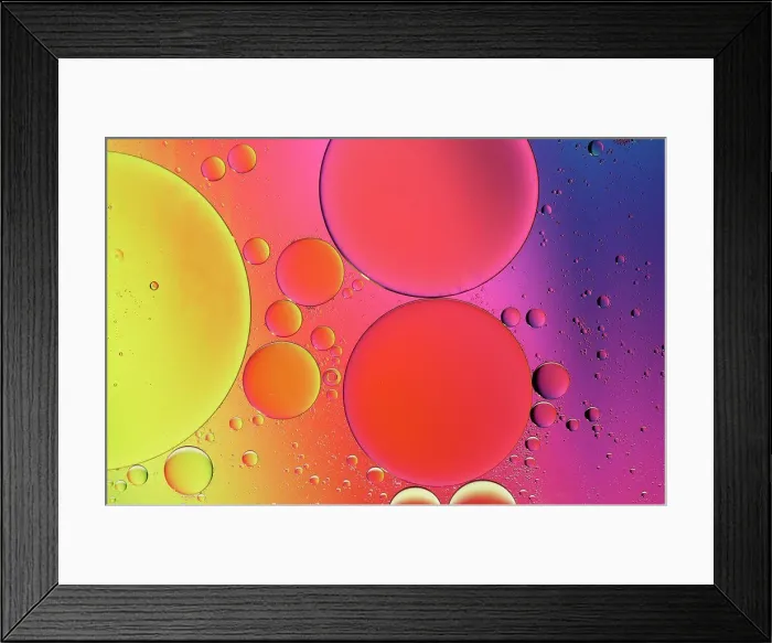 Framed Print : Olive oil drops suspended in water with colorful backgrounds Framed Print : Olive oil drops suspended in water with colorful backgrounds