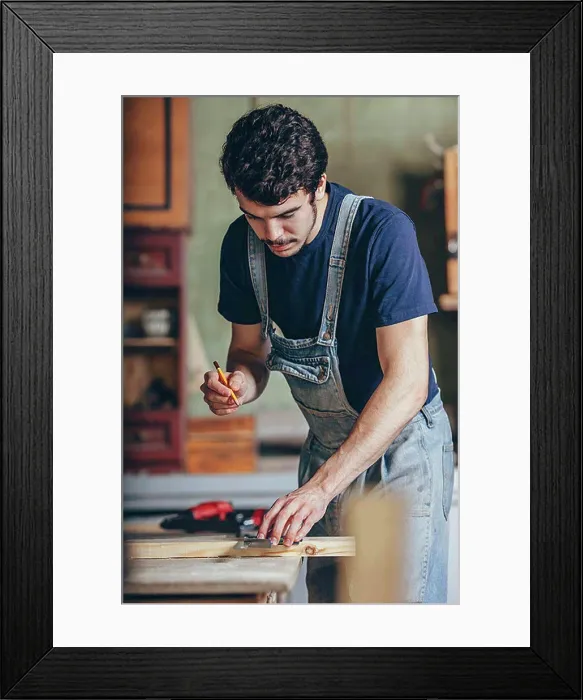 Framed Print : Carpenter marking on wood with pencil and ruler at workshop Framed Print : Carpenter marking on wood with pencil and ruler at workshop