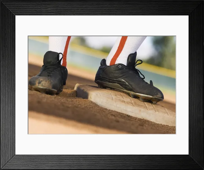 Framed Print : Low section of a baseball player standing base Framed Print : Low section of a baseball player standing base