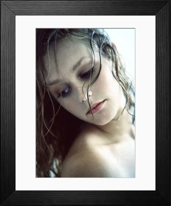 Framed Print : Close-up of a young woman Framed Print : Close-up of a young woman
