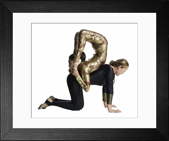 Framed Print : Female contortionist duo performing Framed Print : Female contortionist duo performing