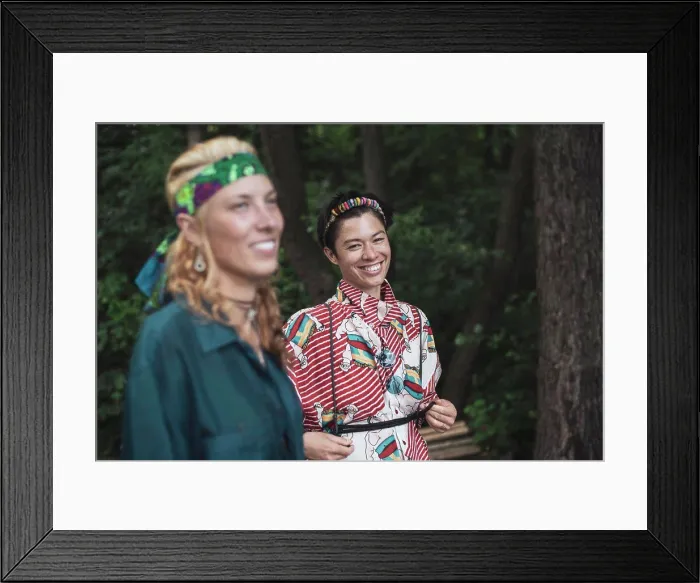 Framed Print : Mixed race women bohemian fashion in forrest together smiling Framed Print : Mixed race women bohemian fashion in forrest together smiling
