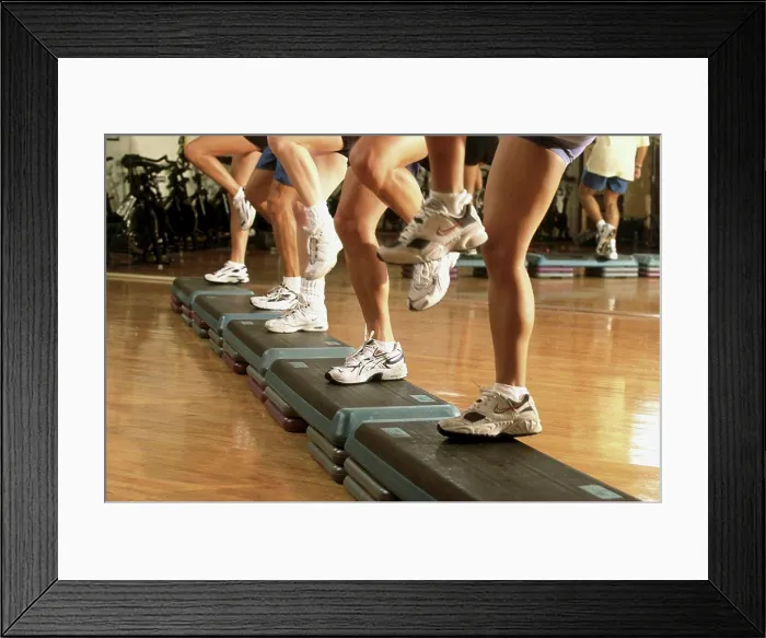 Framed Print : Low section view of a group of people exercising in a step aerobics class Framed Print : Low section view of a group of people exercising in a step aerobics class