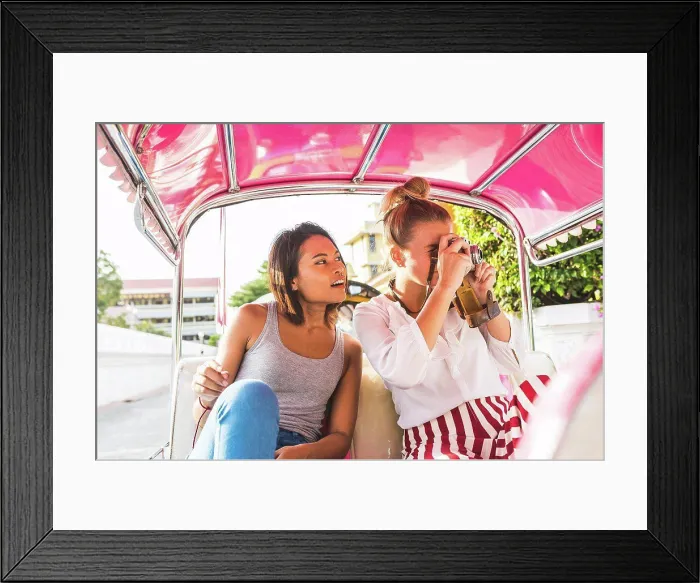 Framed Print : Thailand, Bangkok, two friends riding tuk tuk taking pictures with an old camera Framed Print : Thailand, Bangkok, two friends riding tuk tuk taking pictures with an old camera