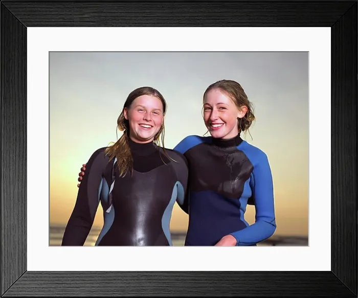 Framed Print : Portrait of two female surfers Framed Print : Portrait of two female surfers