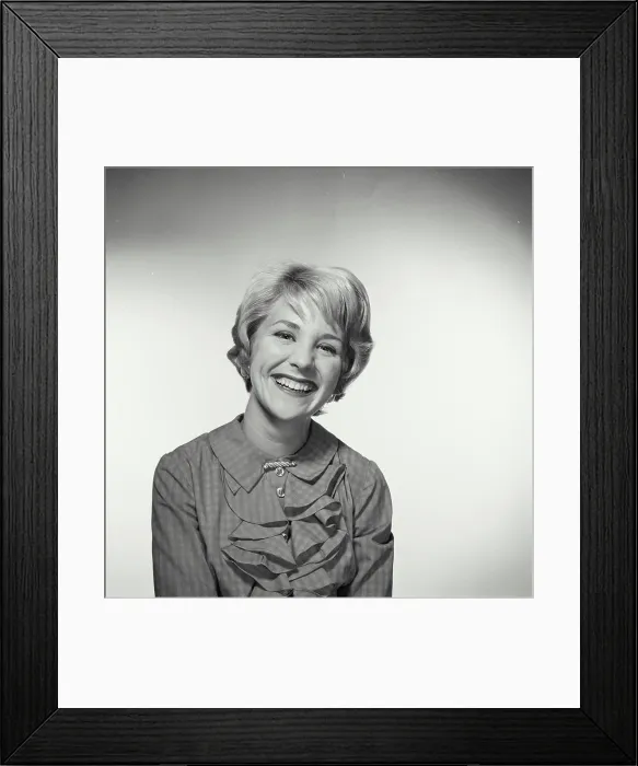 Framed Print : Portrait of a young woman smiling Framed Print : Portrait of a young woman smiling