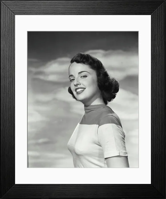 Framed Print : Portrait of a young woman smiling Framed Print : Portrait of a young woman smiling