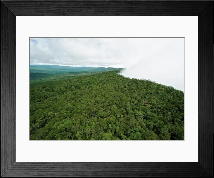 Framed Print : Clouds form along the slanted northern ridge of the Maliau Basin, Sabah, Borneo, East Malaysia Framed Print : Clouds form along the slanted northern ridge of the Maliau Basin, Sabah, Borneo, East Malaysia