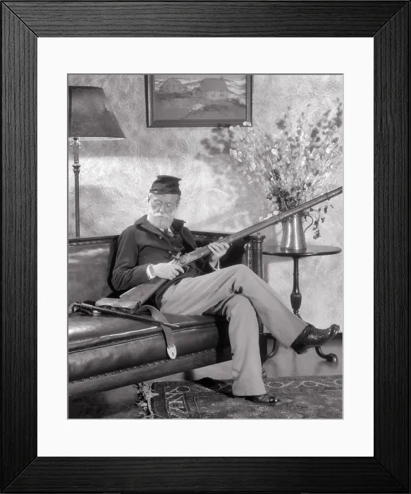 Framed Print : 1920s AMERICAN CIVIL WAR UNION ARMY VETERAN ELDERLY SENIOR MAN REMINISCING SITTING IN OLD UNIFORM HOLDING ANTIQUE RIFLE Framed Print : 1920s AMERICAN CIVIL WAR UNION ARMY VETERAN ELDERLY SENIOR MAN REMINISCING SITTING IN OLD UNIFORM HOLDING ANTIQUE RIFLE