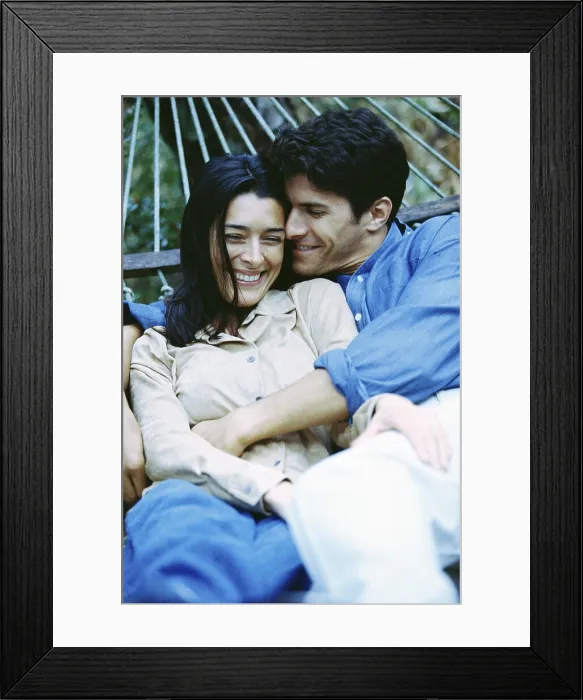 Framed Print : Young couple lying in a hammock Framed Print : Young couple lying in a hammock