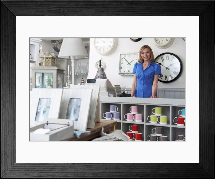 Framed Print : Sales Assiatant In Gift Shop Framed Print : Sales Assiatant In Gift Shop