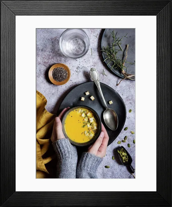 Framed Print : Hands of woman holding a hot pumpkin soup Framed Print : Hands of woman holding a hot pumpkin soup