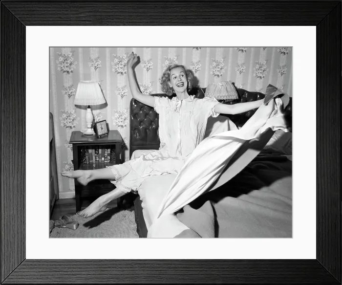Framed Print : 1950s SMILING HAPPY GLEEFUL WOMAN WAKING UP GETTING OUT OF BED FLINGING BACK SHEETS AND BLANKETS Framed Print : 1950s SMILING HAPPY GLEEFUL WOMAN WAKING UP GETTING OUT OF BED FLINGING BACK SHEETS AND BLANKETS