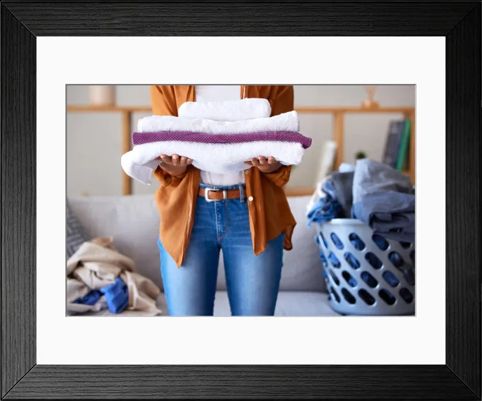 Framed Print : Laundry, towel and texture with cleaning service and woman cleaner Framed Print : Laundry, towel and texture with cleaning service and woman cleaner