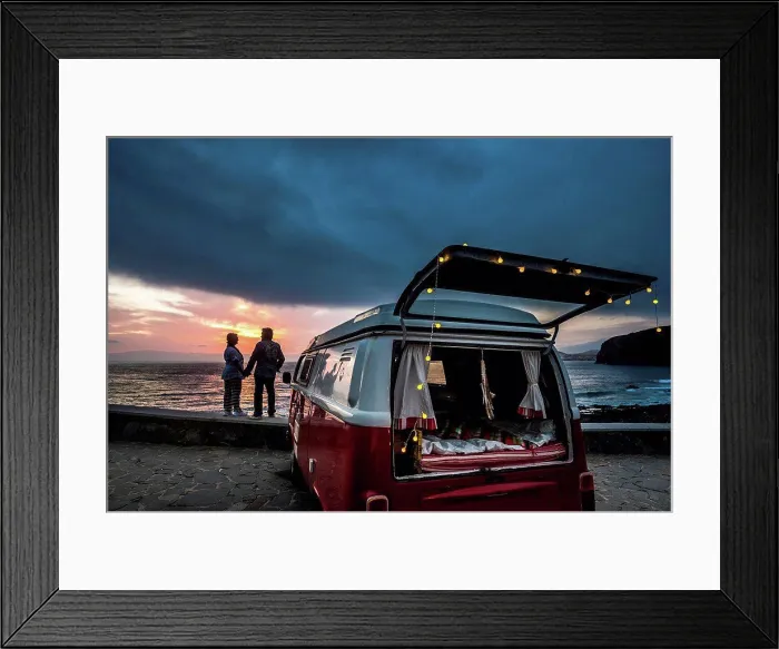 Framed Print : Senior couple traveling in a vintage van, watching sunset at the sea Framed Print : Senior couple traveling in a vintage van, watching sunset at the sea