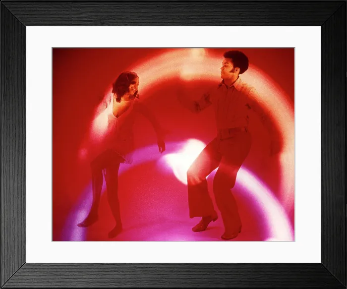 Framed Print : 1960s 1970s AFRICAN AMERICAN COUPLE MAN WOMAN DANCING SHIRT RED TROUSERS SILVER DRESS AFRO HAIR STYLE BELLBOTTOMS Framed Print : 1960s 1970s AFRICAN AMERICAN COUPLE MAN WOMAN DANCING SHIRT RED TROUSERS SILVER DRESS AFRO HAIR STYLE BELLBOTTOMS