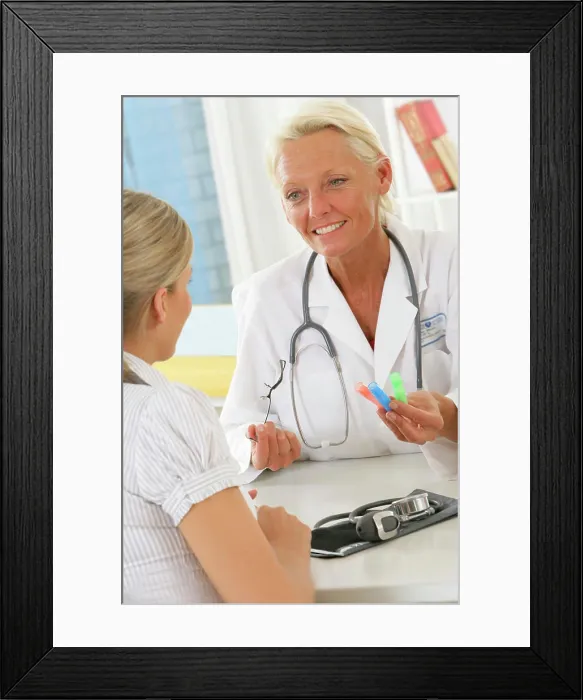 Framed Print : Homeopathy consultation, woman Framed Print : Homeopathy consultation, woman