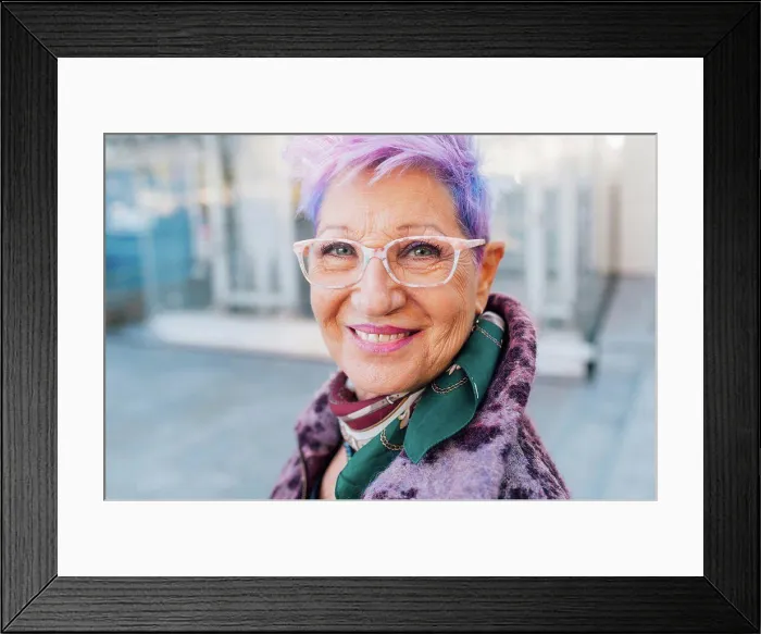 Framed Print : Italy, Portrait of smiling fashionable senior woman Framed Print : Italy, Portrait of smiling fashionable senior woman