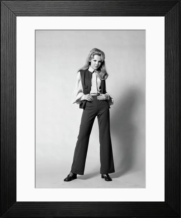 Framed Print : 1960S 1970S Portrait Woman With Long Blond Hair Wearing Flared Pantsuit With Vest Framed Print : 1960S 1970S Portrait Woman With Long Blond Hair Wearing Flared Pantsuit With Vest