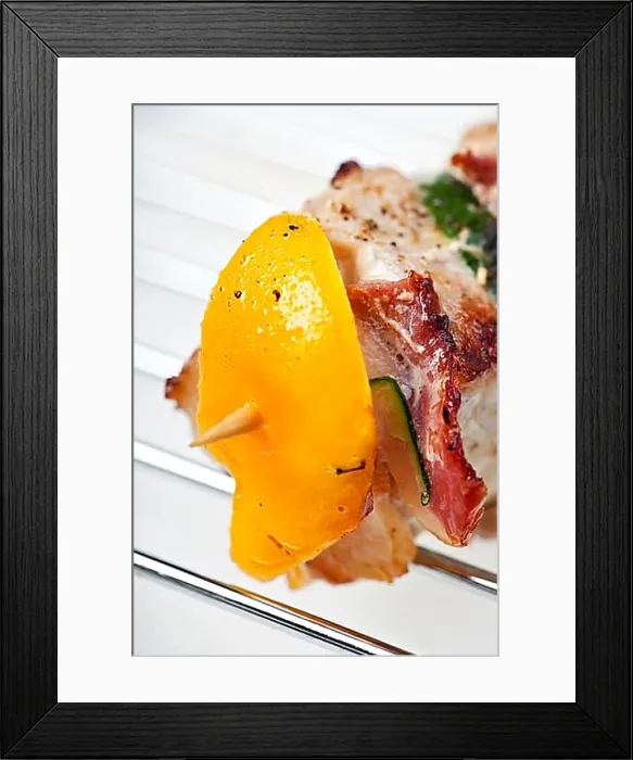 Framed Print : Grilled shashlik on a charcoal grate over a white background Framed Print : Grilled shashlik on a charcoal grate over a white background