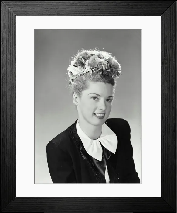 Framed Print : Vintage Photograph. Studio portrait of beautiful woman in jacket and earrings with flower headband Framed Print : Vintage Photograph. Studio portrait of beautiful woman in jacket and earrings with flower headband